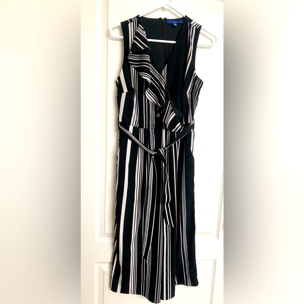 Woman’s sleeveless black w/ white stripes pants jumper